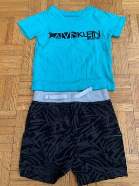 Calvin Klein Jeans Teal Logo Tee with Black Patterned Shorts